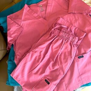 Four sets of new Woman’s Scrubs